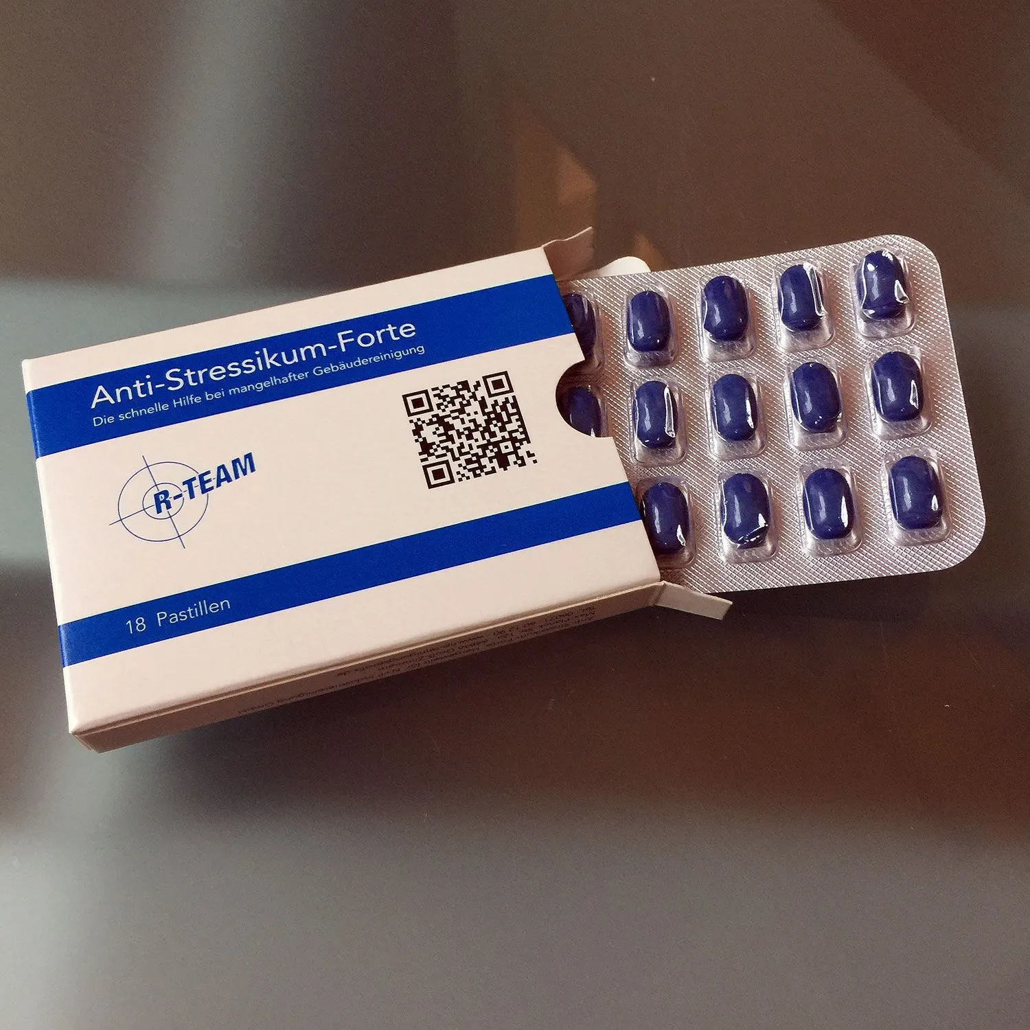 Produktbild von Anti-Stress-Pillen in Tabletten-Optik: Werbe-Bonbons mit individuell gestaltbarer Verpackung und Beipackzettel für effektive Werbung.