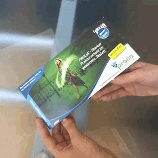 Produktbild von Interessanter Sichtfenster-Mailer mit Bildwechselmechanik: Doppelte Titelseite der Klappkarte mit rundem Sichtfenster für spezielle Bildwechselmechanik; nach Aktivierung erscheint zweites Motiv.
