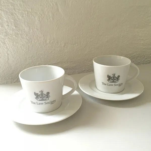 Produktbild von Kaffeetasse mit Logo aus hochwertigem Porzellan, schlichtes konisches Design, Standard-Werbeanbringung auf Tasse & Untertasse, Material: Porzellan, Gewichg, Höhe: 65 mm, Durchmesser: 80 mm, Inhalt: 18 cl.