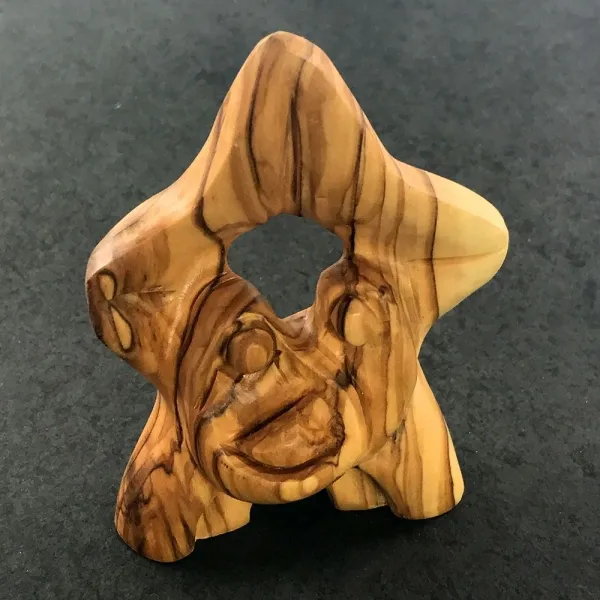 Produktbild von Kleine Krippe aus Olivenholz, handgefertigt und mit Lasergravur, ideal für Werbeeinbindung, Material: geöltes Olivenholz, Maße: 7x10 cm.
