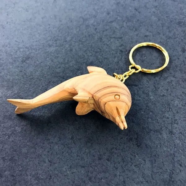 Produktbild von Olivenholz Delphin Schlüsselanhänger - Handgefertigte Figur aus geöltem Olivenholz mit Schlüsselring und Kette (Länge: 6,5 cm)