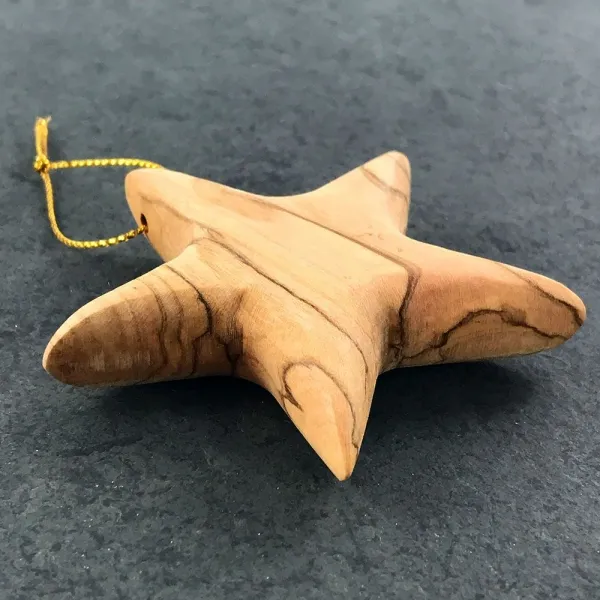 Produktbild von Olivenholz-Stern Baumanhänger - Handgefertigter Weihnachtsbaumanhänger aus nachhaltigem Olivenholz, perfekt für die festliche Dekoration des Christbaums.