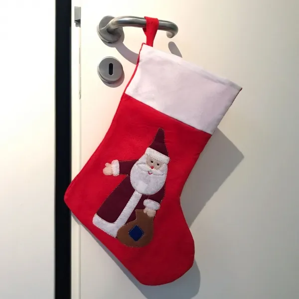 Produktbild von Nikolaus-Socke aus Filz, Größe 41 x 26 cm, weißer Umschlag mit Plastisoltransfer-Druck, maximal 10 x 5 cm, 4 Farben.